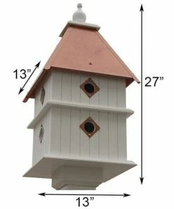 A Wing And A Prayer Plantation Bird House With Hammered Copper Colored Metal Roof